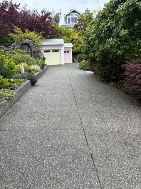 Concrete sealing services in Victoria, BC after pressure washing removal of mold and moss